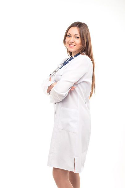 青い phonen を白で隔離美しい若い女性医師 - 写真・画像