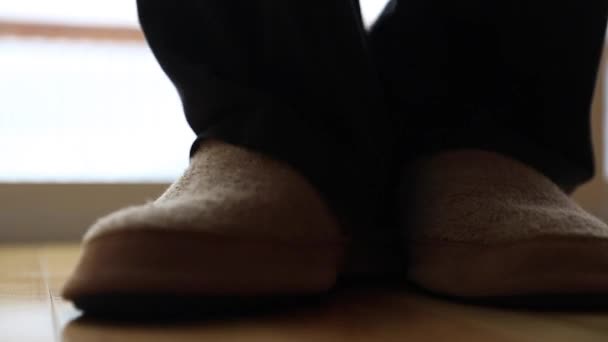 a man wears a pair of slippers - Video, Çekim