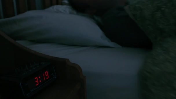 man lying in bed - Materiaali, video