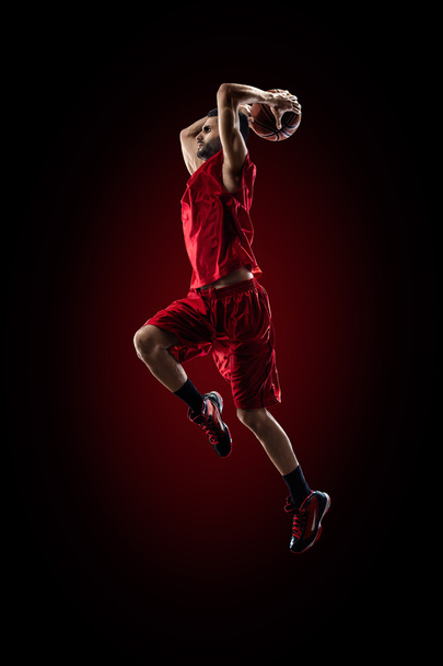 Basketball player in action is flying high - 写真・画像