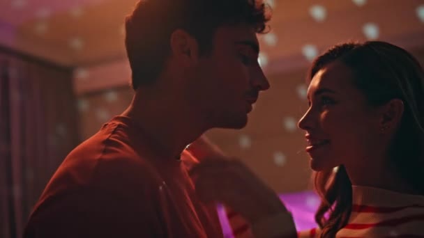 Sensual couple moving together at disco ball lights close up. Happy beautiful woman hugging smiling man dancing at night party apartment. Tender pair enjoying music feeling love at weekend date. - Footage, Video