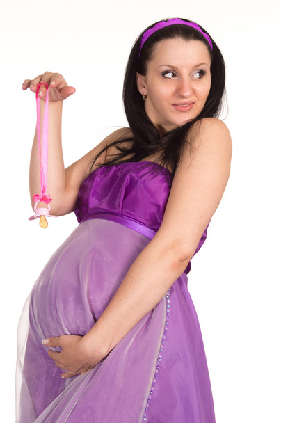 Pregnant woman in dress - Фото, изображение
