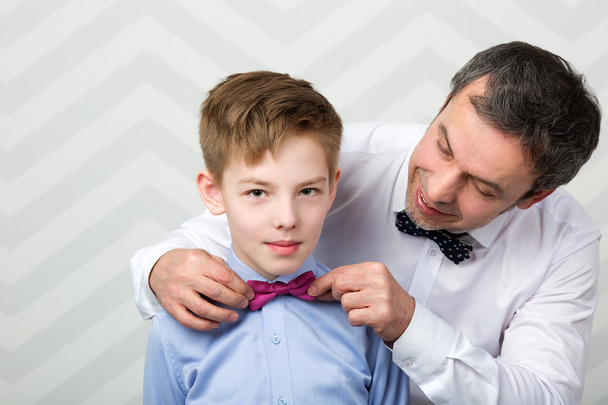 Father adjusting sons bowtie - Photo, Image