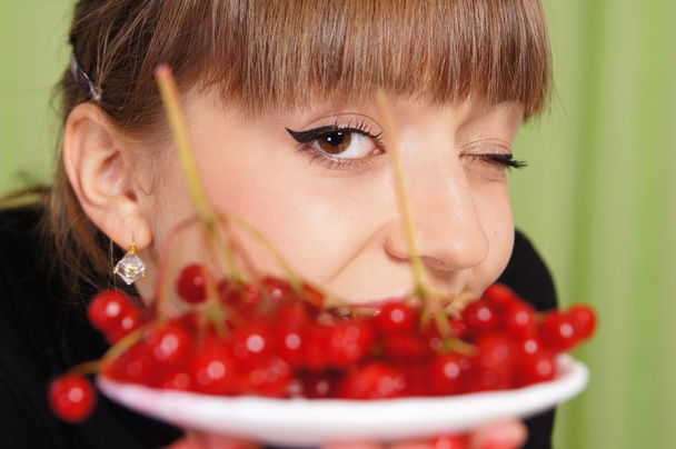 Girl and berries - Фото, изображение