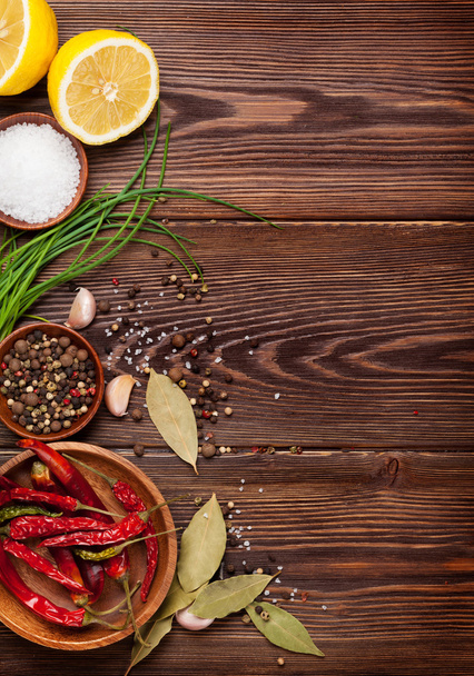 Various spices on wooden background - Photo, image