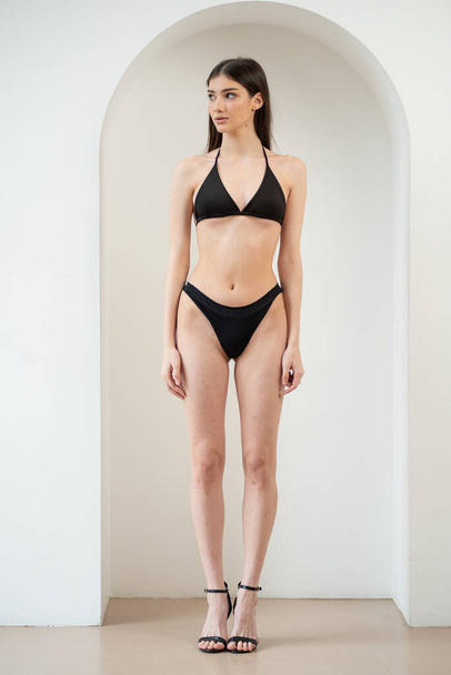 young woman model snapshot lingerie posing on white background - Fotografie, Obrázek