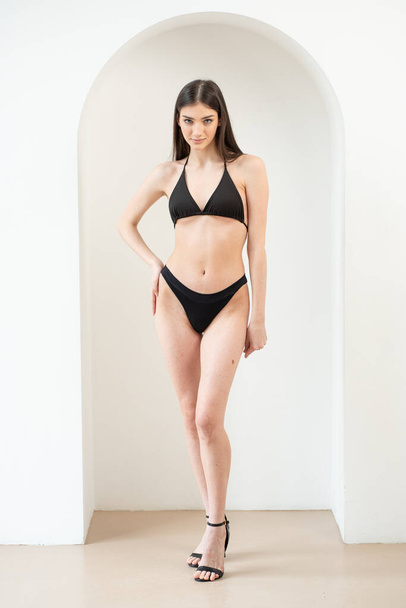 young woman model snapshot lingerie posing on white background - Foto, Imagem