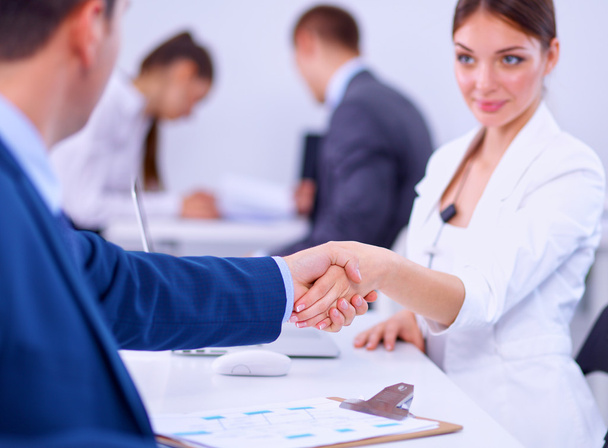 Business people shaking hands, finishing up a meeting - Foto, Imagem