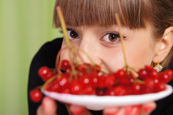 Girl and berries - Фото, изображение