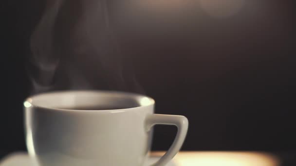 HD video of coffee cup with steam rising - Filmati, video