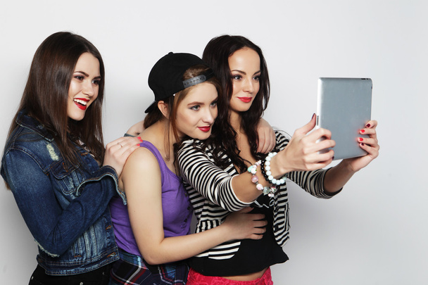 girls friends taking selfie with digital tablet - Foto, Imagem