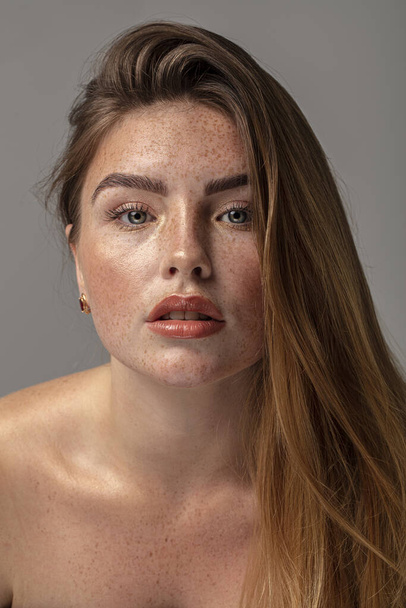 Beautiful natural woman with freckles on face and body, delicate look. - Zdjęcie, obraz
