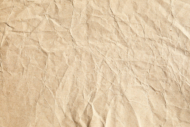 Brown macro vertical crumpled paper texture - Photo, image