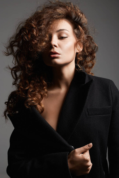 Fashion portrait of Beautiful young woman. sexy beautiful girl with make-up and curly Hair - Photo, Image
