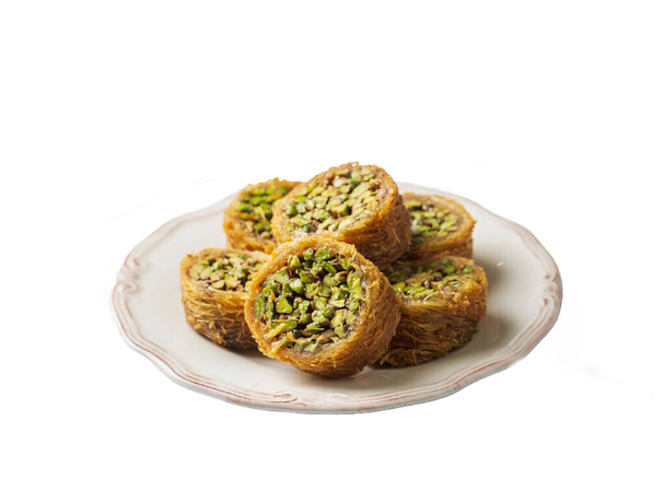 Traditional Turkish desserts; Kadaif stuffed with pistachios. Turkish name; Kadayif dolmasi or dolma kadayif - Photo, Image