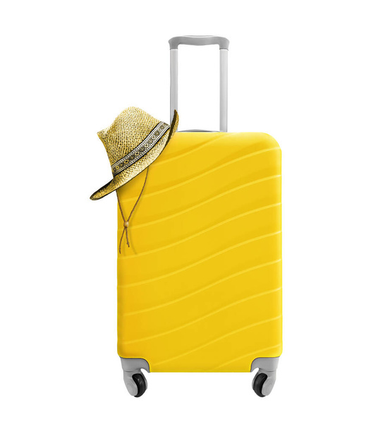 Maleta amarilla y sombrero de paja aislados sobre fondo blanco - Foto, imagen