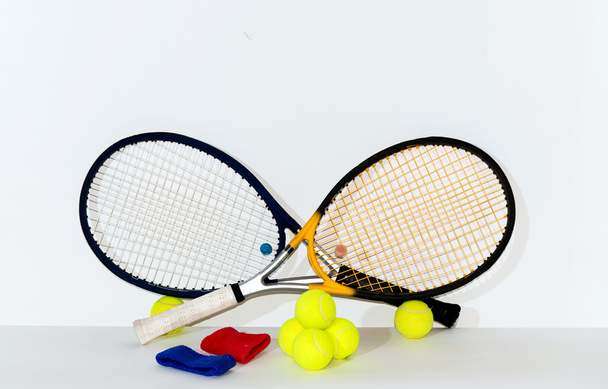raqueta de tenis, pelota, vendaje
 - Foto, imagen