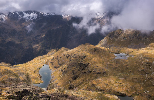 Aerial View of Caraussans Lake in the French Pyrenees - Photo, Image