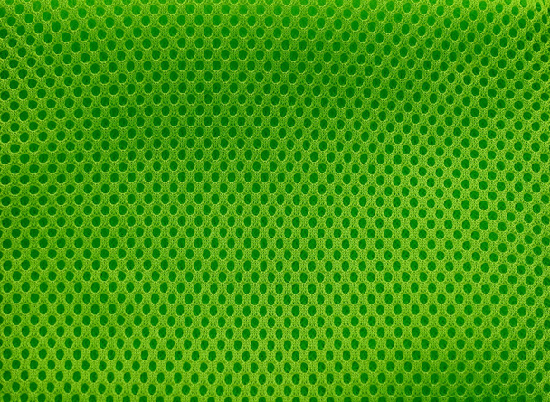 Воздушная сетка неоновая зеленая ткань. Сэндвич с тканями. Полиэстер. - Фото, изображение