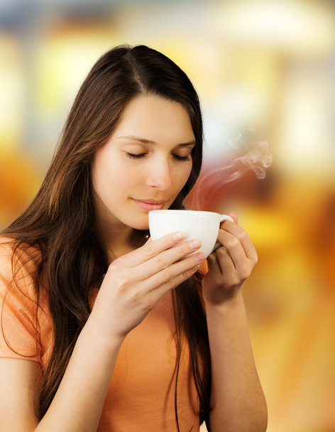 Young woman with coffee - Photo, Image