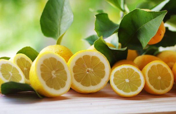 Fresh lemons on table - Fotografie, Obrázek