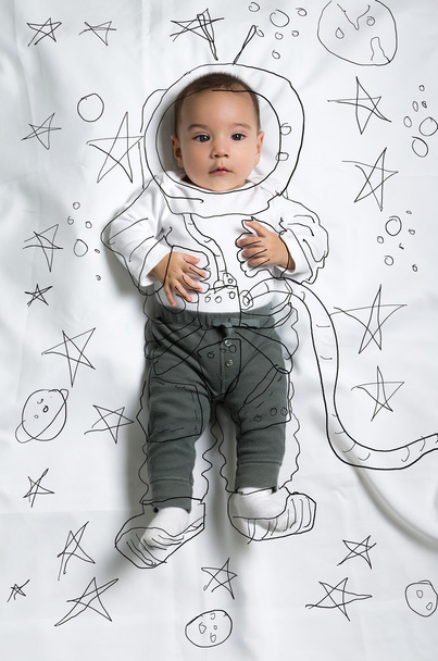 Cute baby boy decorated as an astronaut - Foto, Imagem