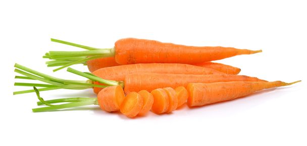  Zanahorias bebé aisladas sobre un fondo blanco
 - Foto, imagen