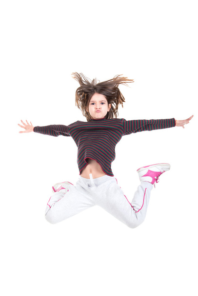 jong meisje springen - Foto, afbeelding
