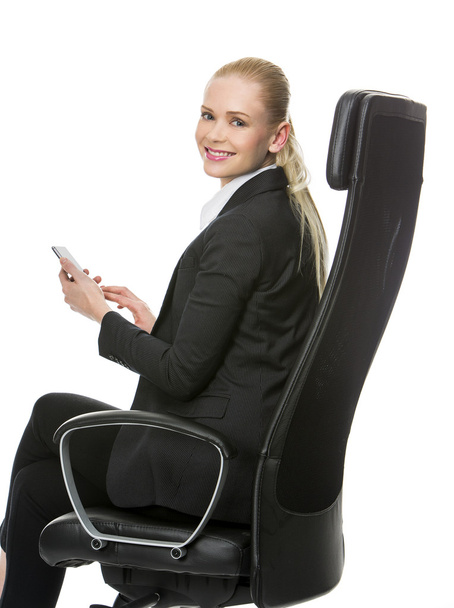 Femme d'affaires assise sur une chaise
 - Photo, image