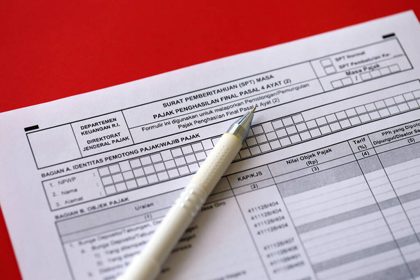 Индонезийская налоговая форма уведомления письмо SPT для окончательного периода подоходного налога Статья 4 пункт 2 о бухгалтерской таблице - Фото, изображение