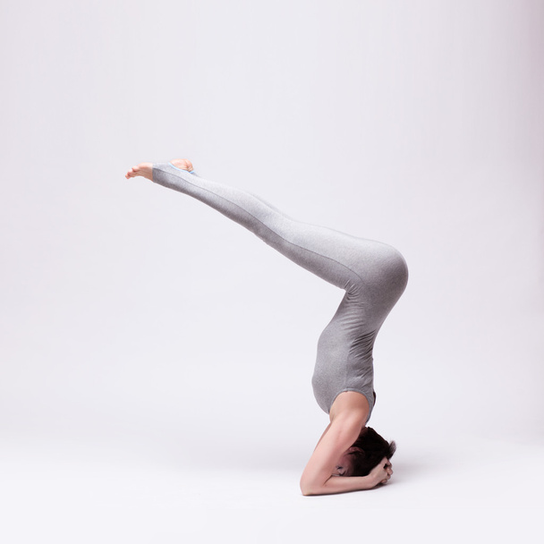 young beautiful woman yoga posing - Foto, Imagen