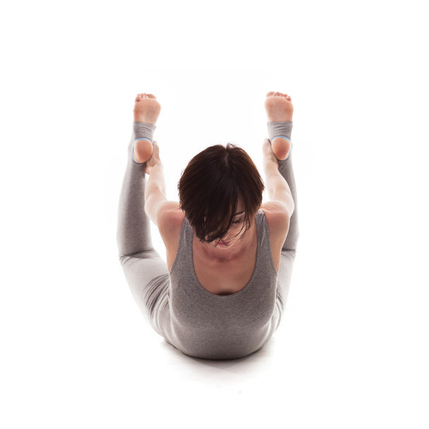young beautiful woman yoga posing. isolated - Fotografie, Obrázek