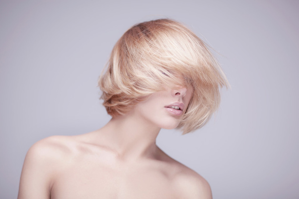 studio shot of beautiful young blond woman - Fotografie, Obrázek