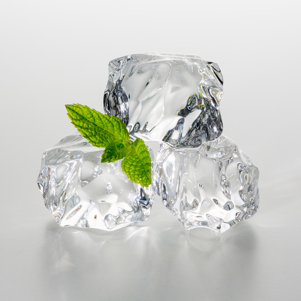 heap of ice cubes with mint - Photo, Image