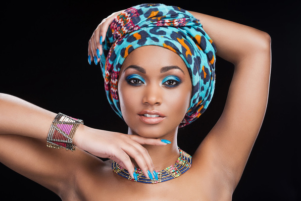 African woman in headscarf and jewelry - Zdjęcie, obraz