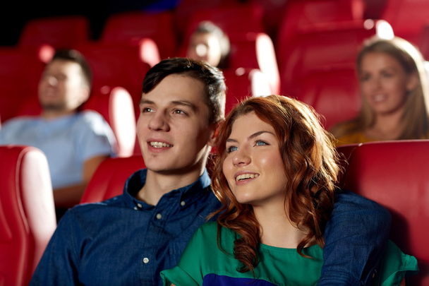 happy friends watching movie in theater - Φωτογραφία, εικόνα
