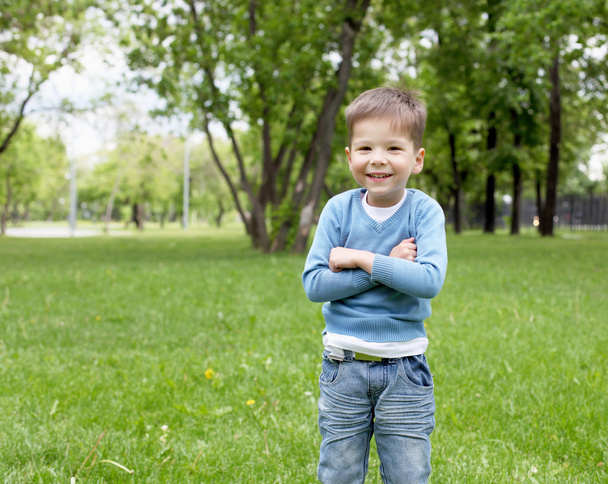 Portrait of a little boy outdoors - Фото, изображение
