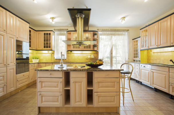 Kitchen with island - Фото, изображение