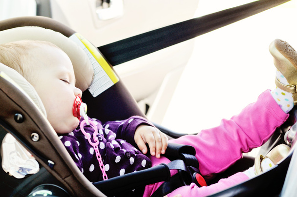 baby sleeping in car - Foto, Bild