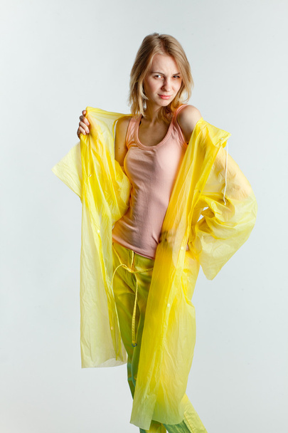 girl in a raincoat - 写真・画像
