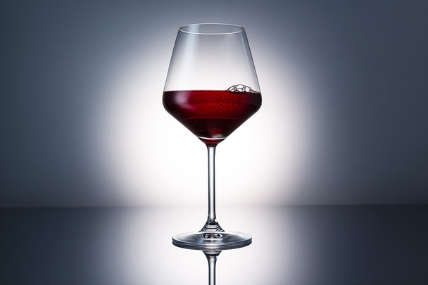 cold red wine glass with dew - Фото, изображение