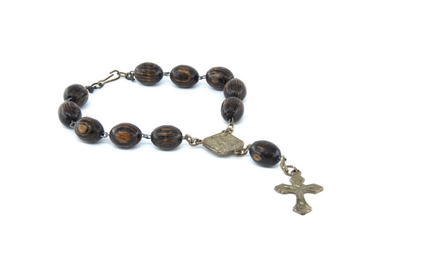 Rosary with wooden beads and a crucifix isolated on white background - Photo, Image