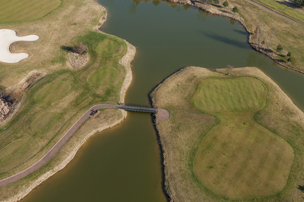 Aerial view over golf field - 写真・画像