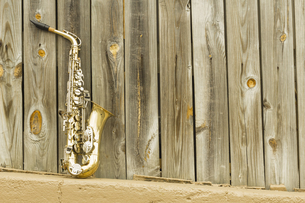 Saxophone Clôture en bois
 - Photo, image