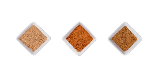 Various Indian Spices in Small White Bowls on white background - Photo, Image