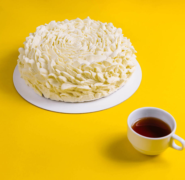 Coffee Mousse Cake with Coffee Cup on Yellow Background - Photo, Image