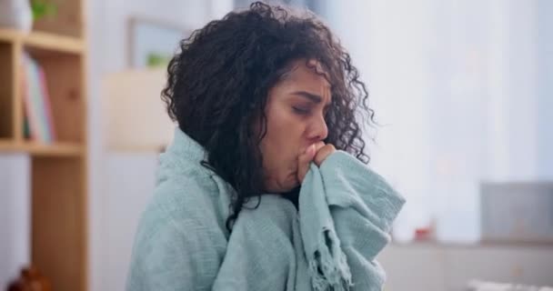 Home, chest pain and cough with woman, blanket and breathing problem of lungs in a living room. Person, apartment and girl with asthma and illness with sore throat and tuberculosis with covid or sick. - Materiaali, video