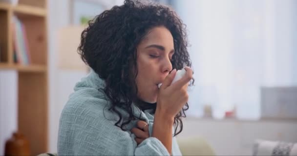 Woman, asthma pump and home with self care, sick and person on couch for wellness. Girl, apartment and lady with health issue and medicine with spray and breathing with cough, illness and allergies. - Imágenes, Vídeo