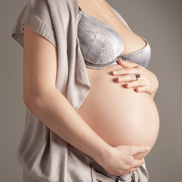 Pregnant woman in studio - Fotoğraf, Görsel