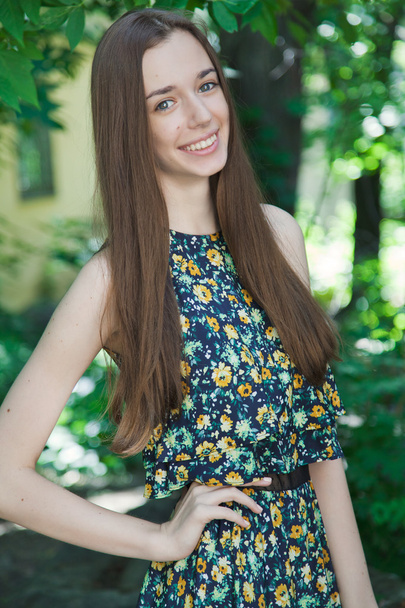 Young beautiful teen girl in summer park - Photo, Image